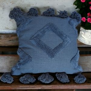 Magaschoni Blue textured decorative pillow.